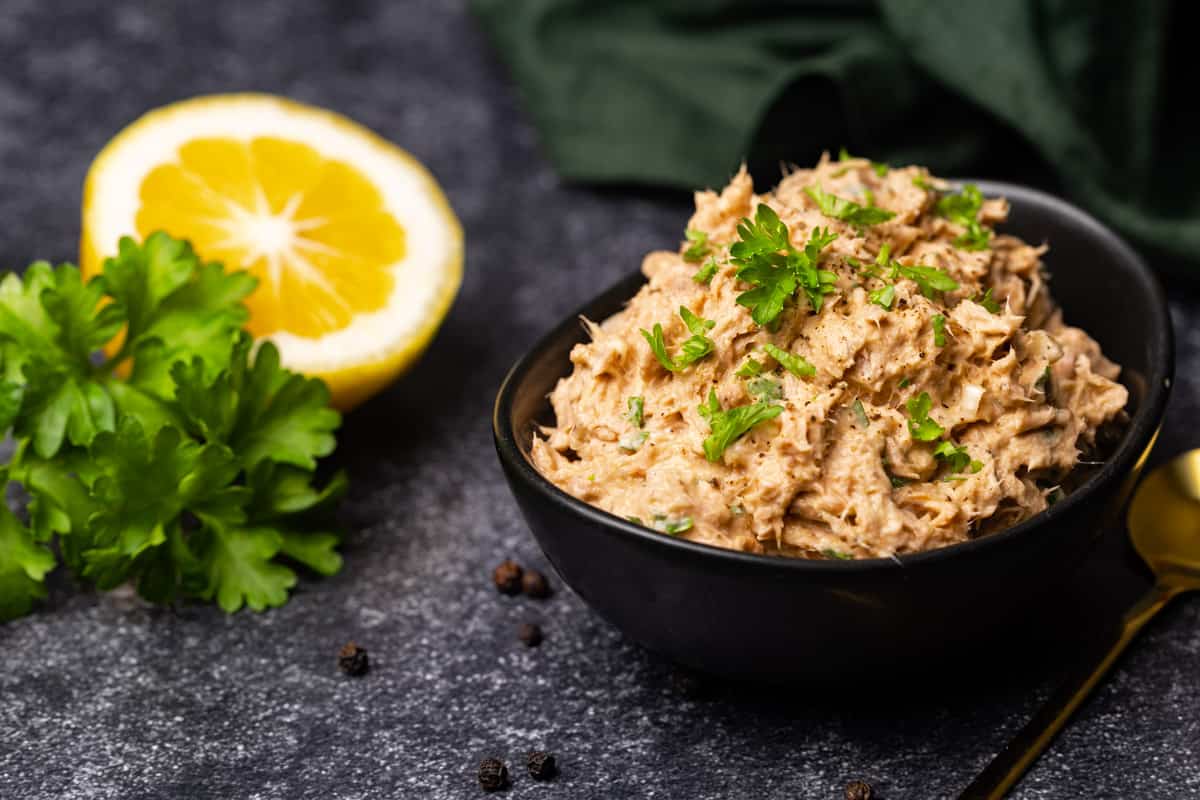 A black bowl filled with smoked tuna tip.