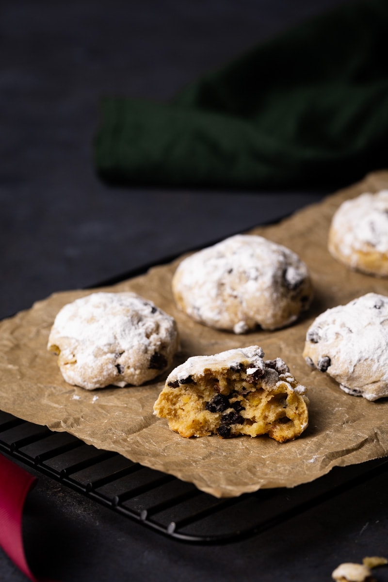 A tray of stollen cookies next to a napkin.