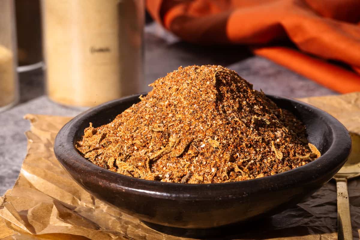 Chipotle spice mix in a black bowl.