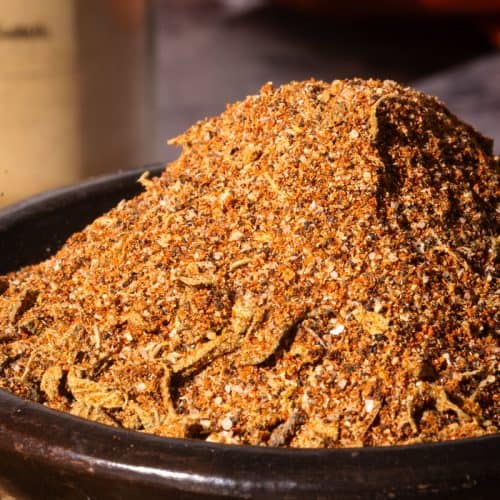 Chipotle spice mix in a black bowl.