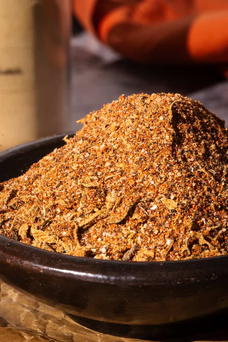 Chipotle spice mix in a black bowl.