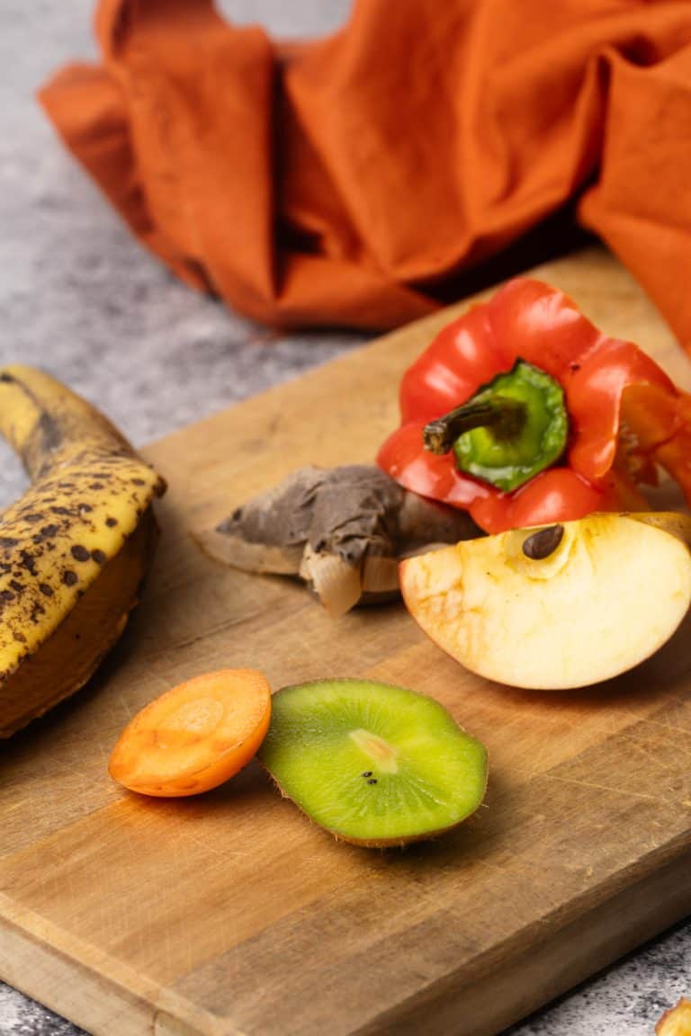 Food scraps on a wooden board.