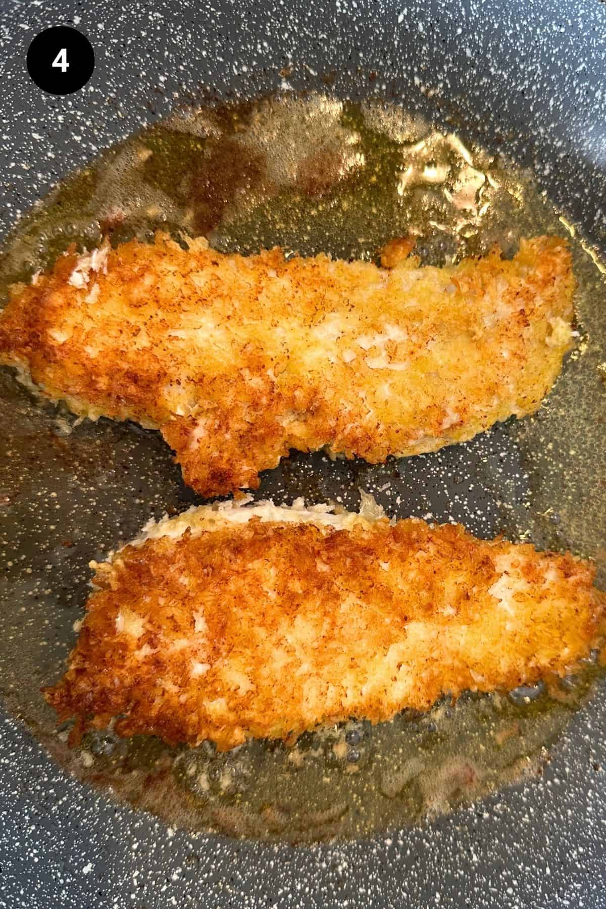 Chicken schnitzel being fried.