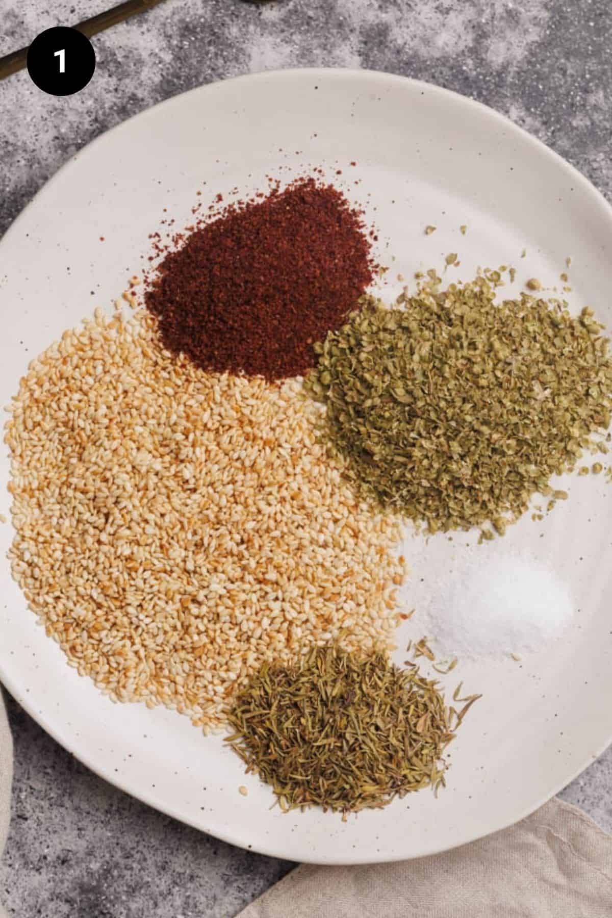Za'atar ingredients on a small white plate.