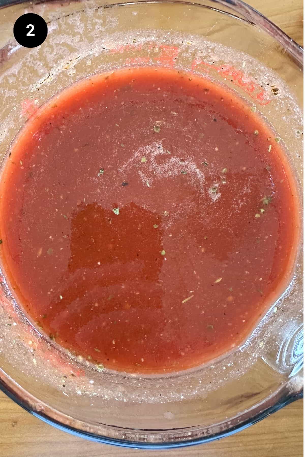 Tomato sauce mixed in one large pitcher.