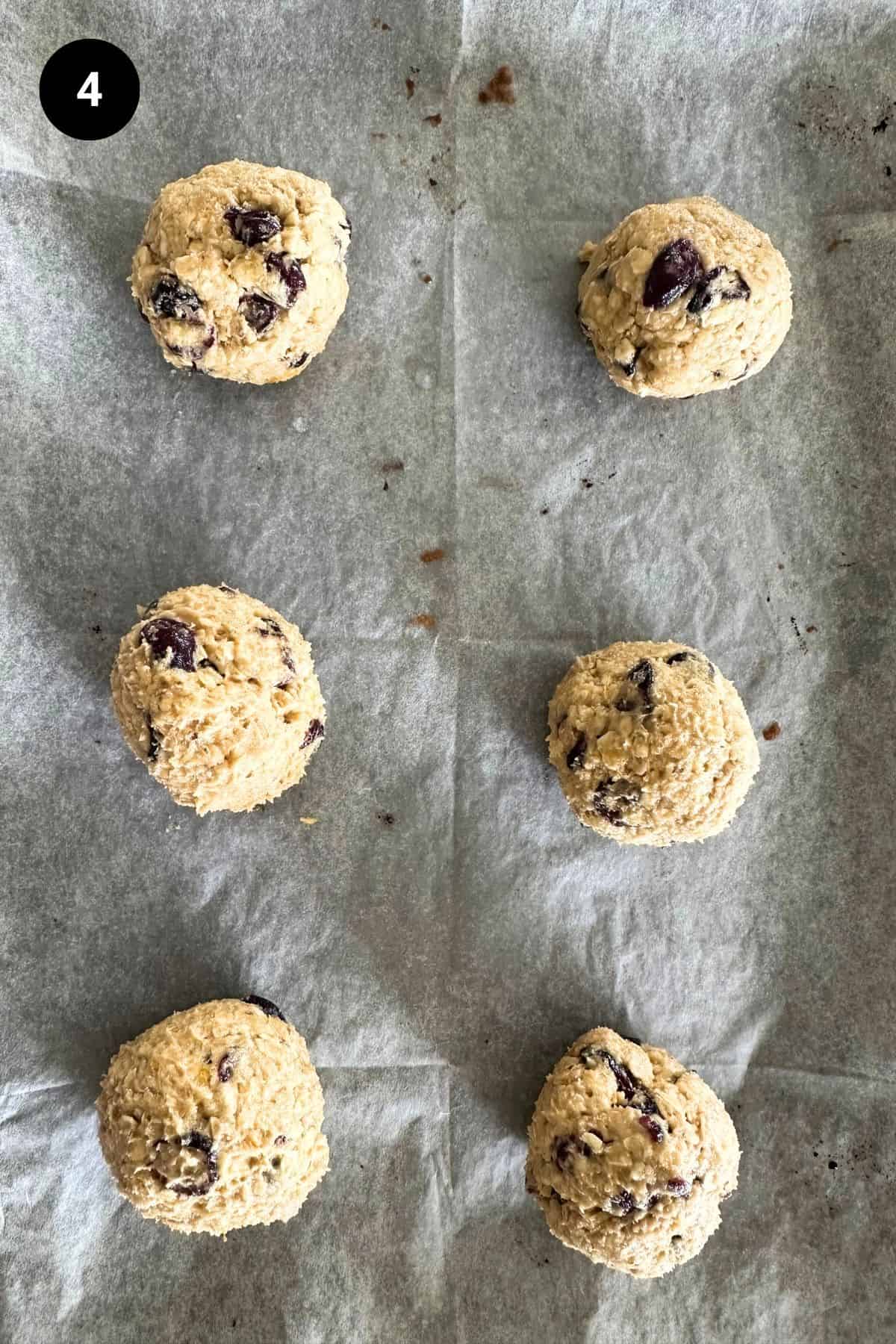 Shaped cookies on a baking sheet.