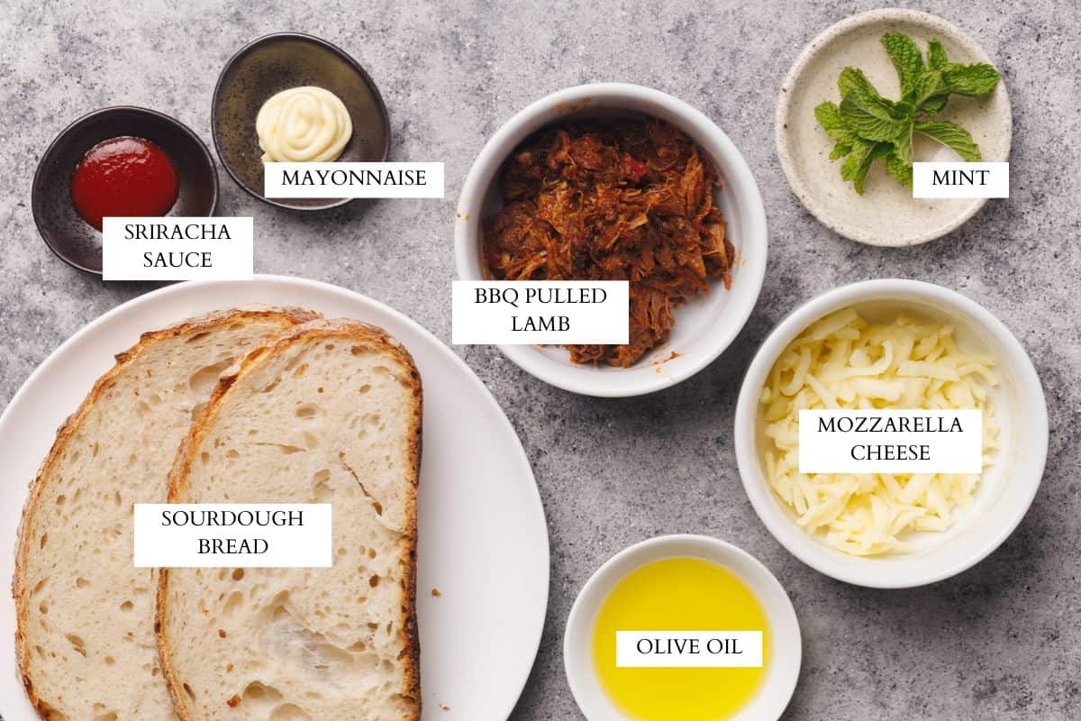 Ingredients laid out to make a grilled lamb sandwich.