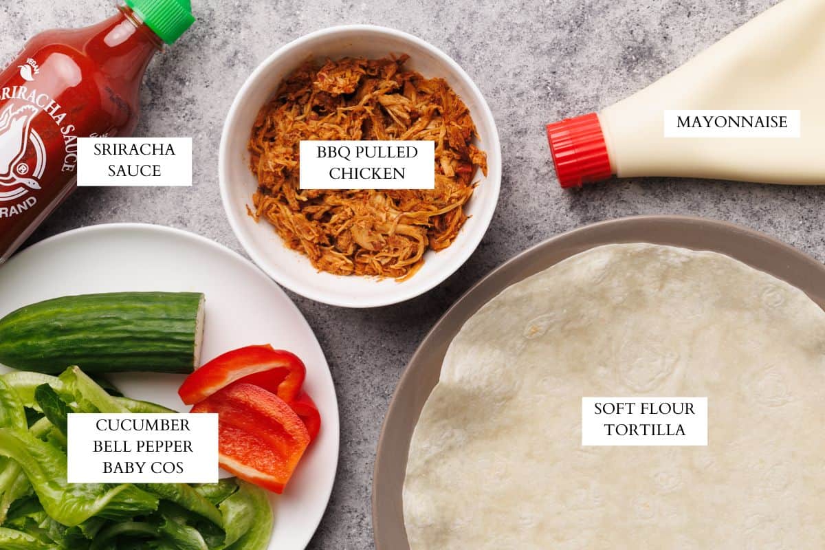 Ingredients laid out to make a pulled chicken wrap.