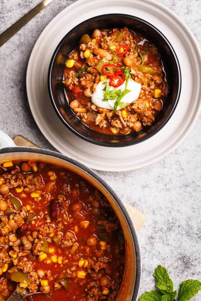 Chili being served from the Dutch oven.