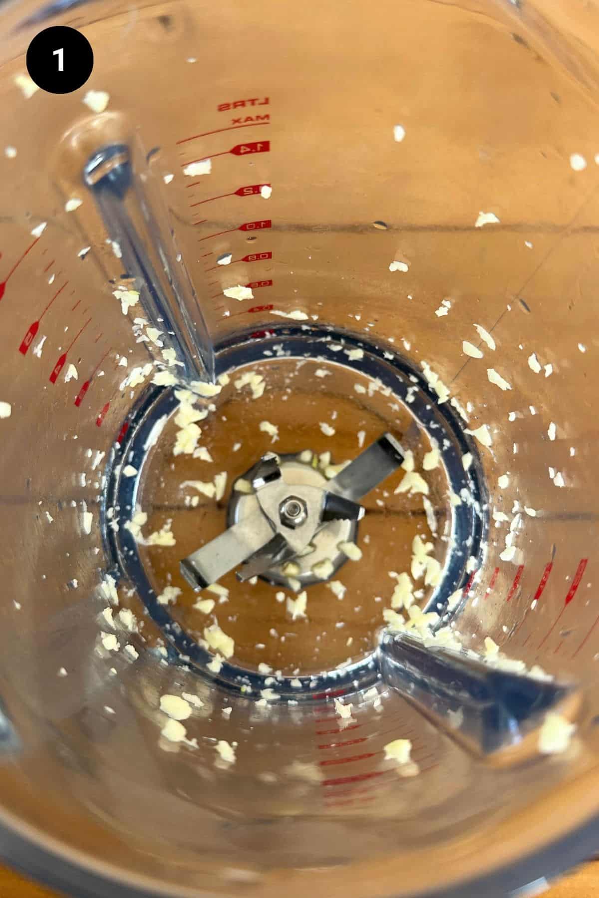 Garlic blended in a stand up blender.