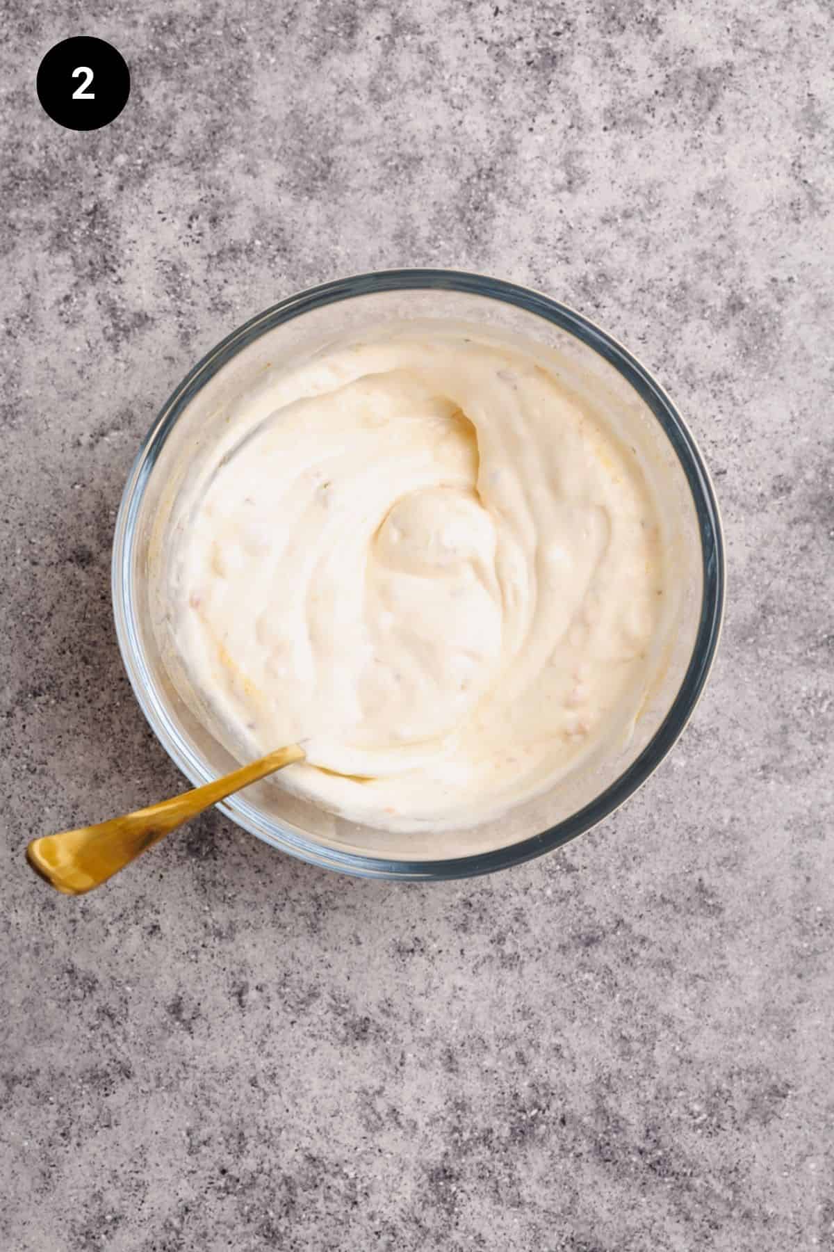Harissa yogurt after mixing.