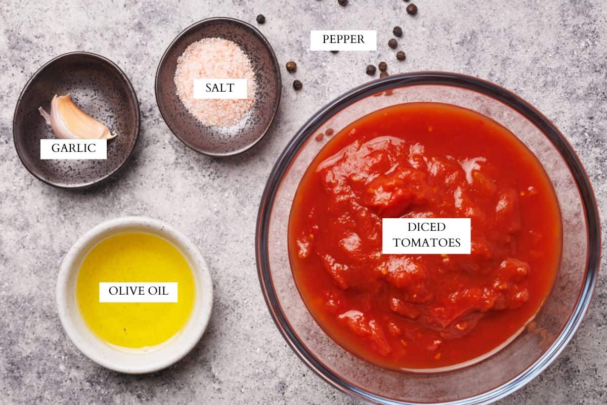 Ingredients laid out to make no cook pizza sauce.