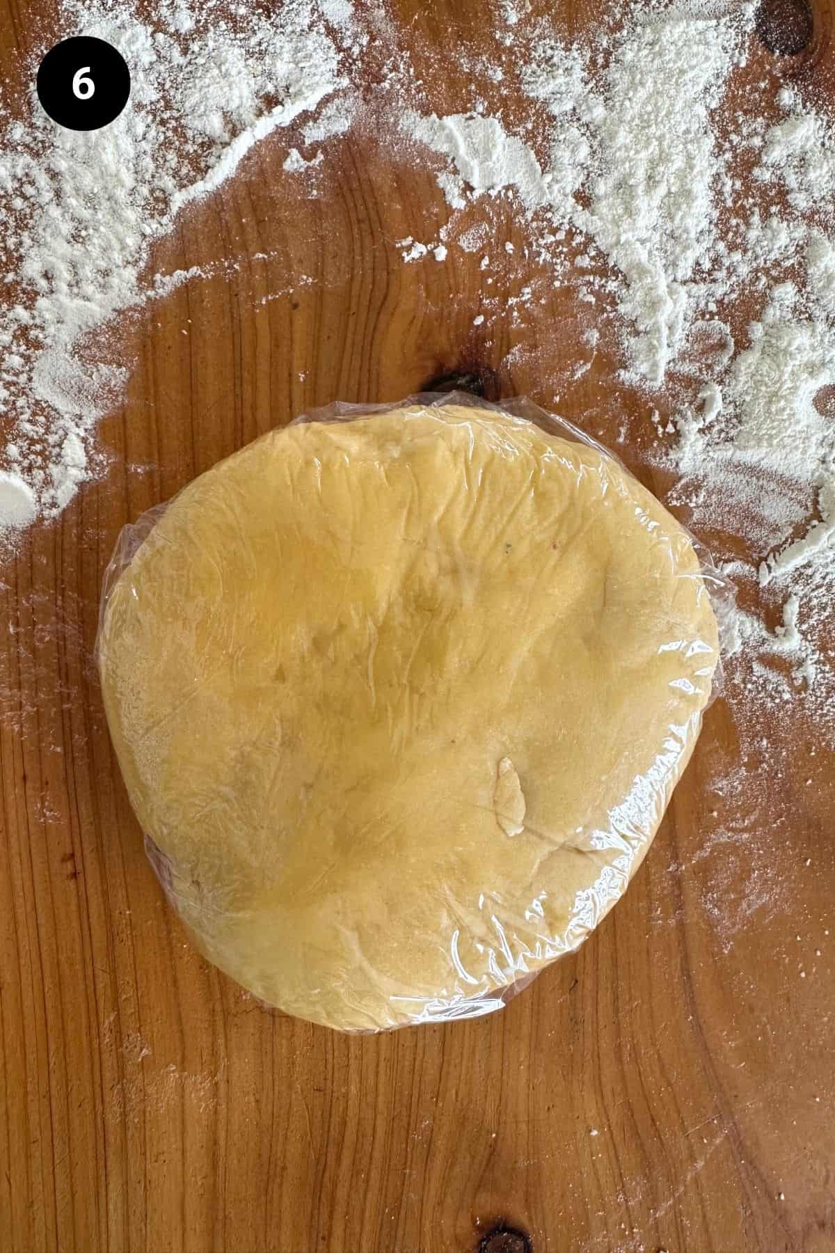 Pasta dough wrapped in clingfilm.