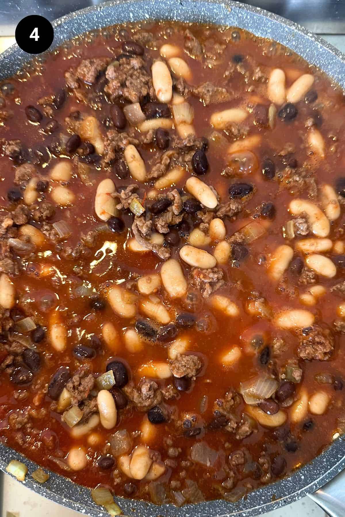 Close up of hamburger baked beans in a pan.