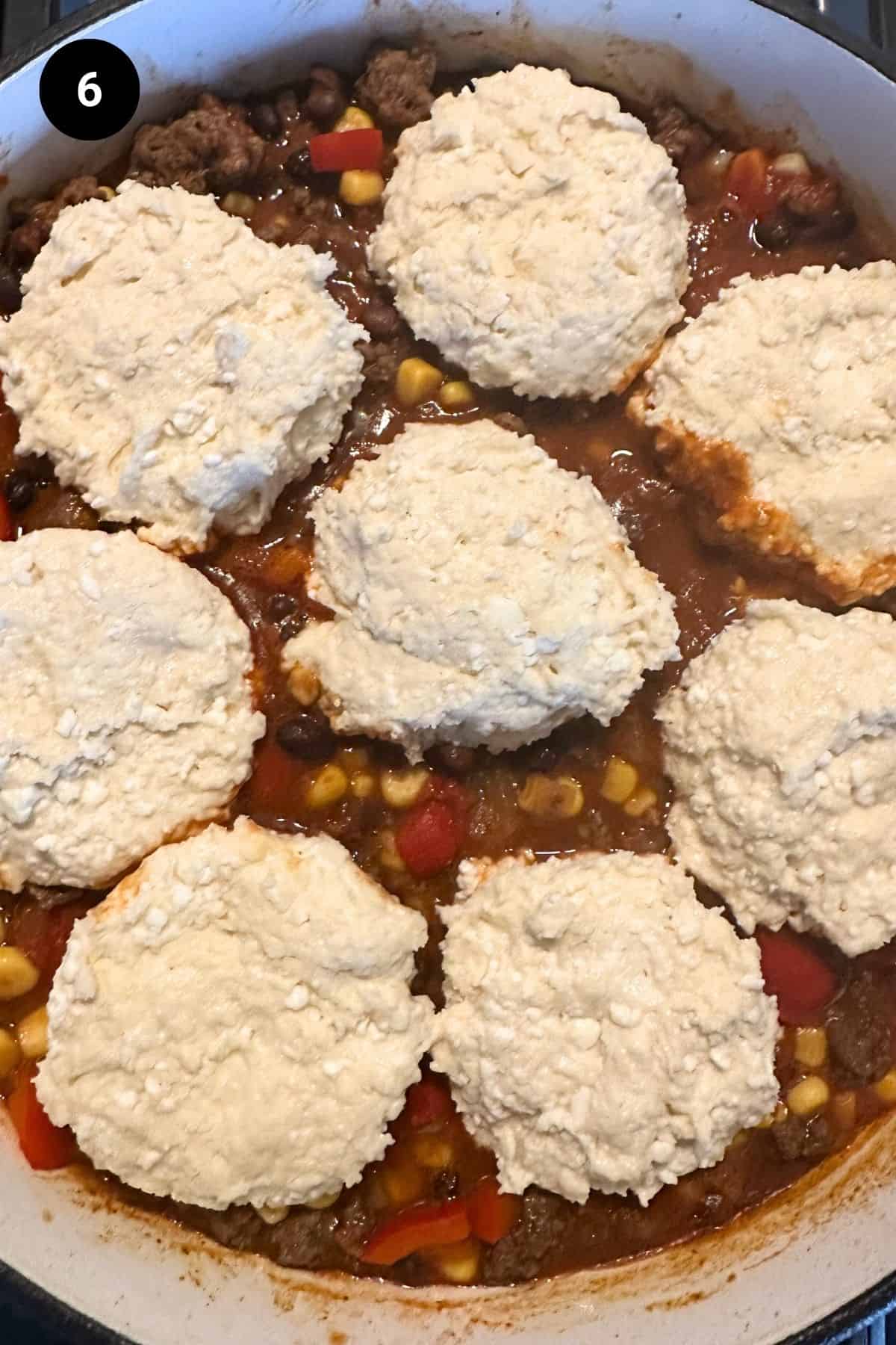 Unbaked casserole in a Dutch oven.