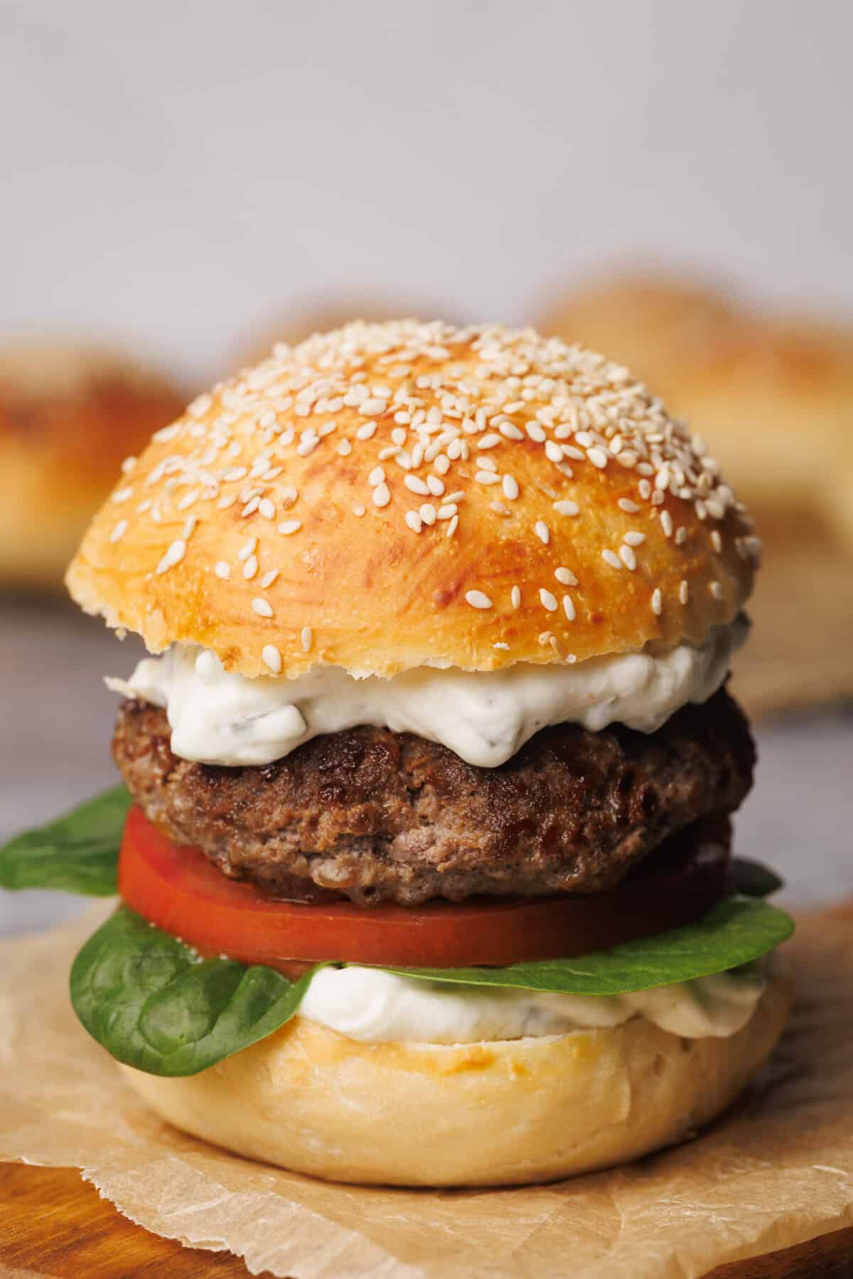Burger on a wooden board.