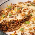 Close-up view of the Mexican Lasagna with a slice taken out of it.