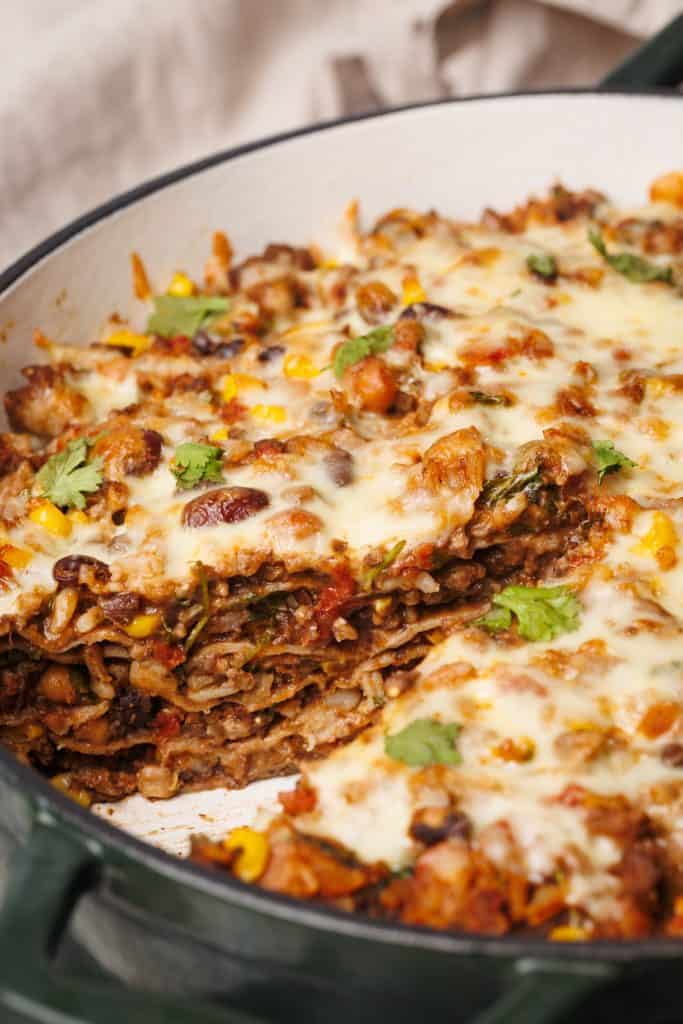 Close-up view of the Mexican Lasagna with a slice taken out of it.