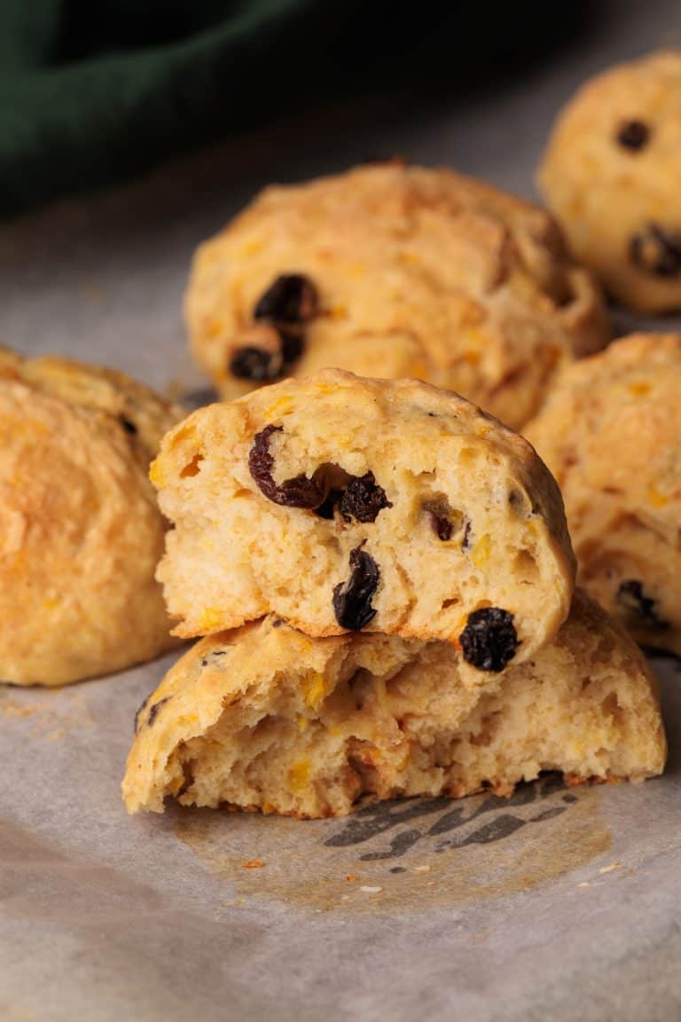 Spiced Fruit Bread Rolls on parchment paper.